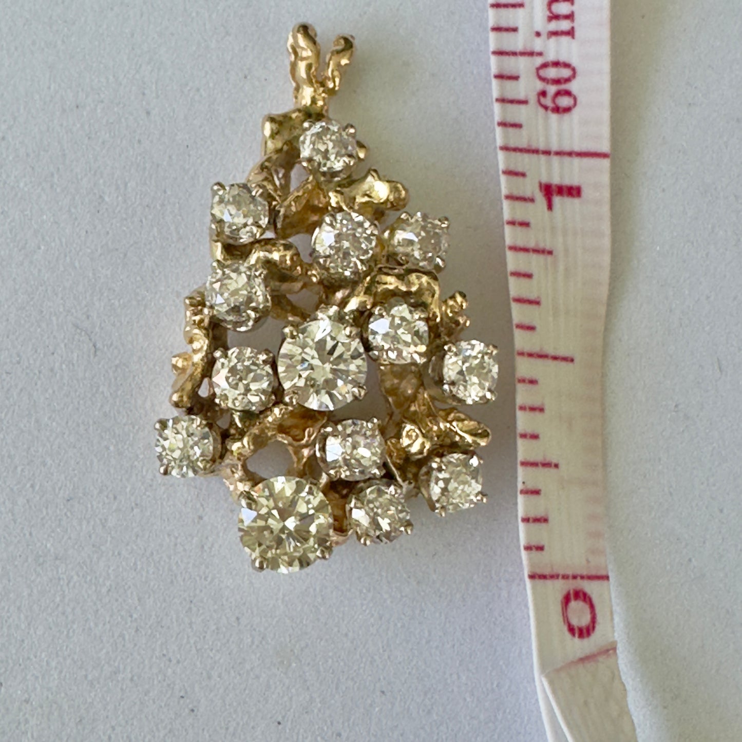 Vintage 3.5 cttw Old cushion , old European and transitional diamonds in a 14k brutalist pendant