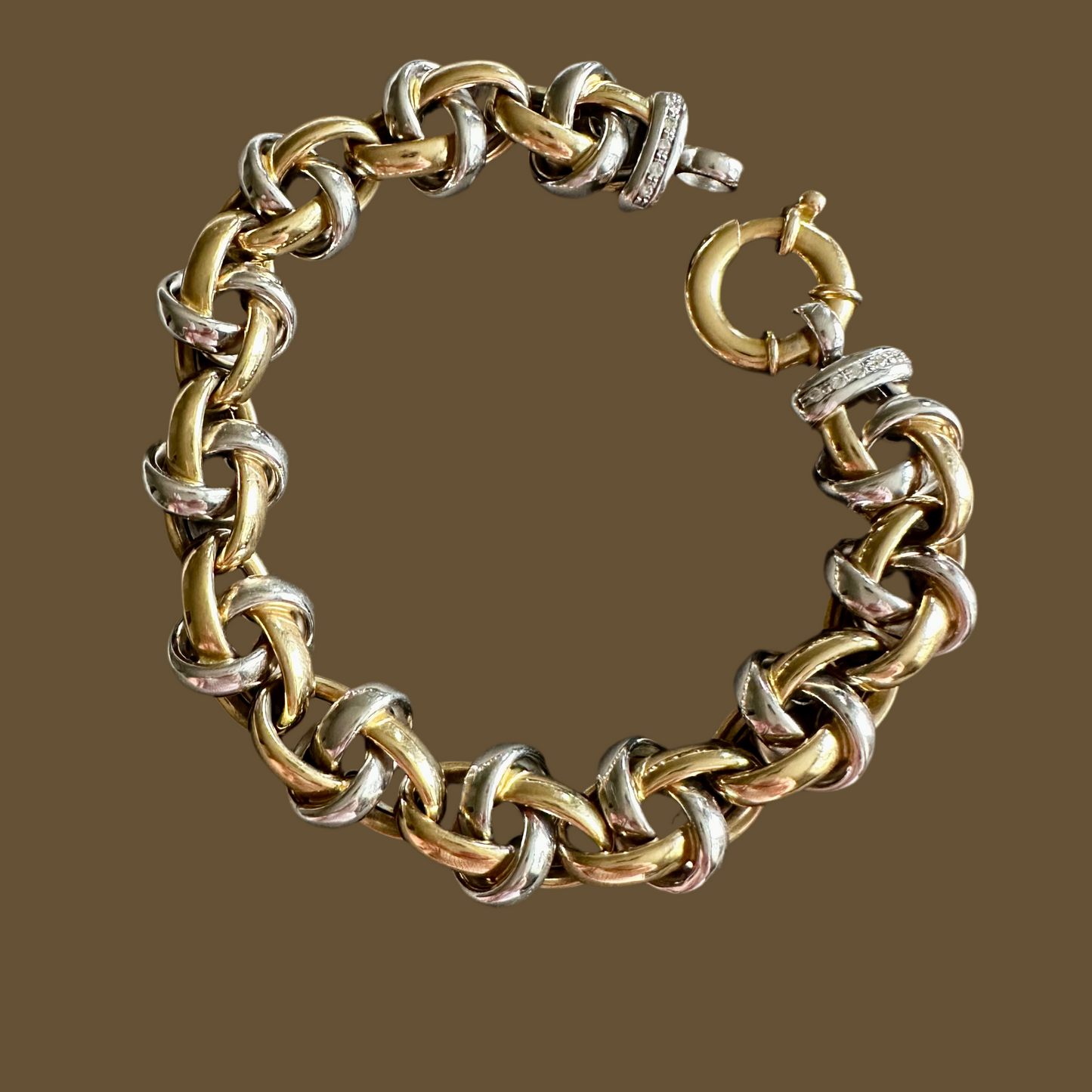 18k white and yellow gold oval link bracelet with toggle clasp and diamonds