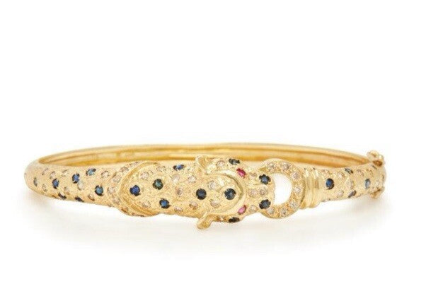 VINTAGE YELLOW GOLD AND GEMSTONE PANTHER BANGLE BRACELET