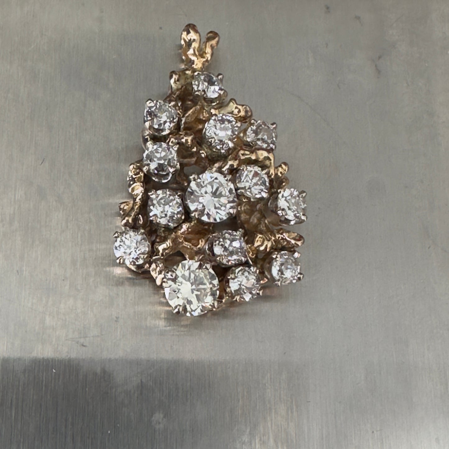 Vintage 3.5 cttw Old cushion , old European and transitional diamonds in a 14k brutalist pendant