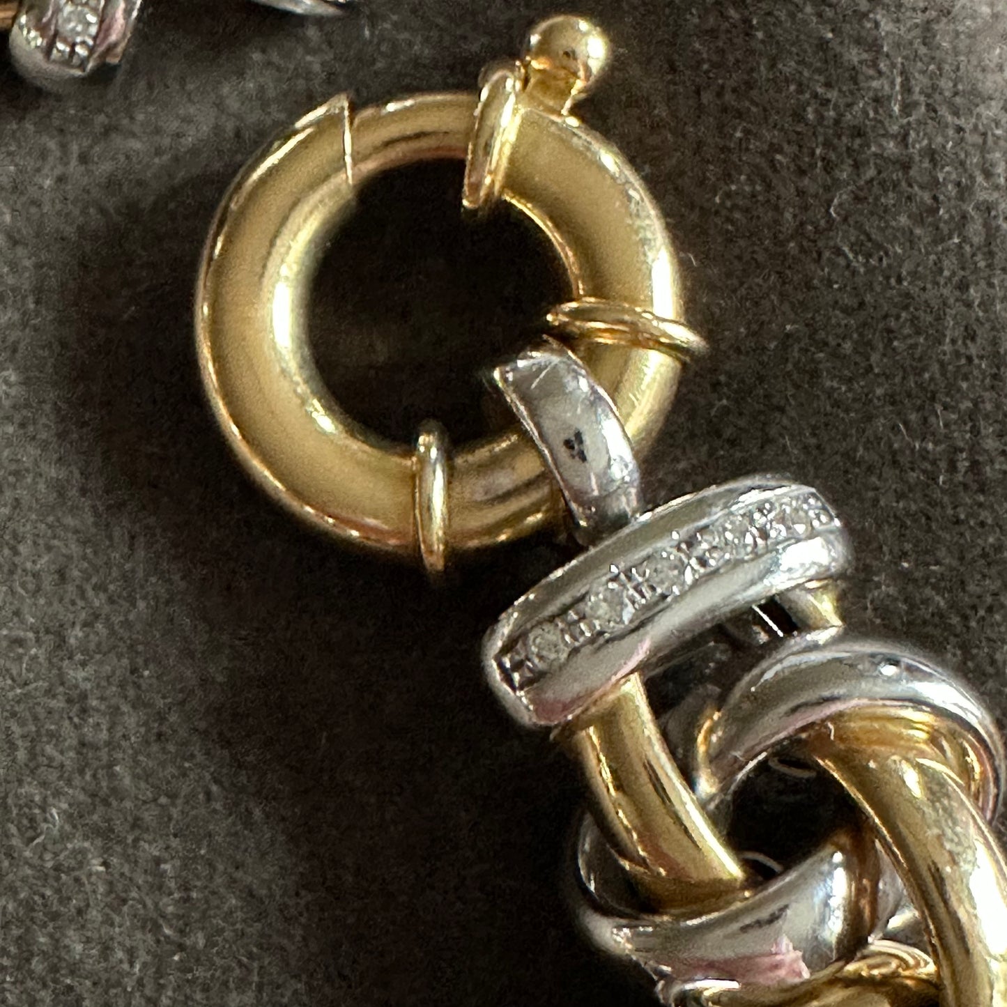 18k white and yellow gold oval link bracelet with toggle clasp and diamonds