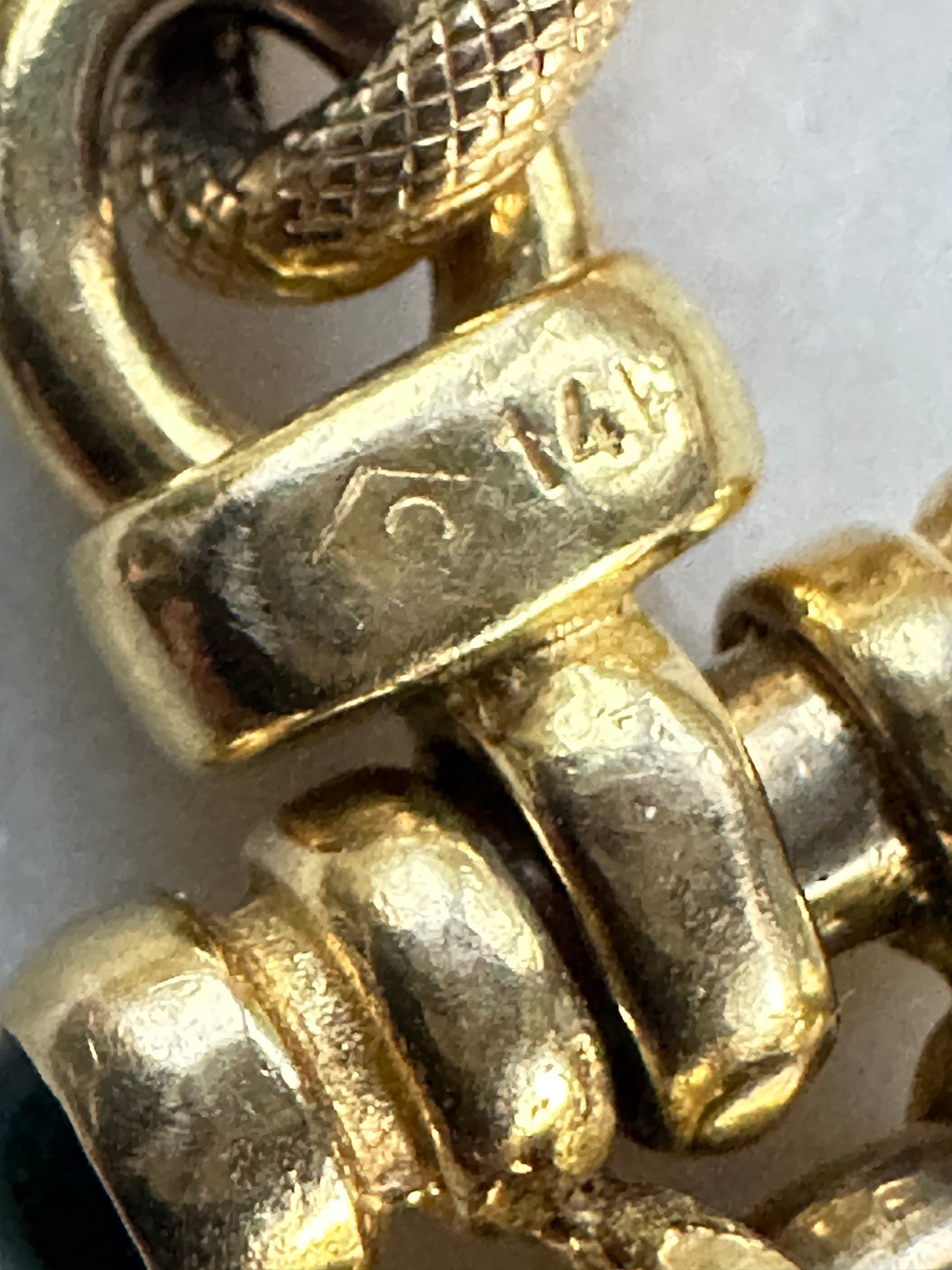Italian 14k Gold fancy Link 1/2 textured with emerald accents end caps 7.25“