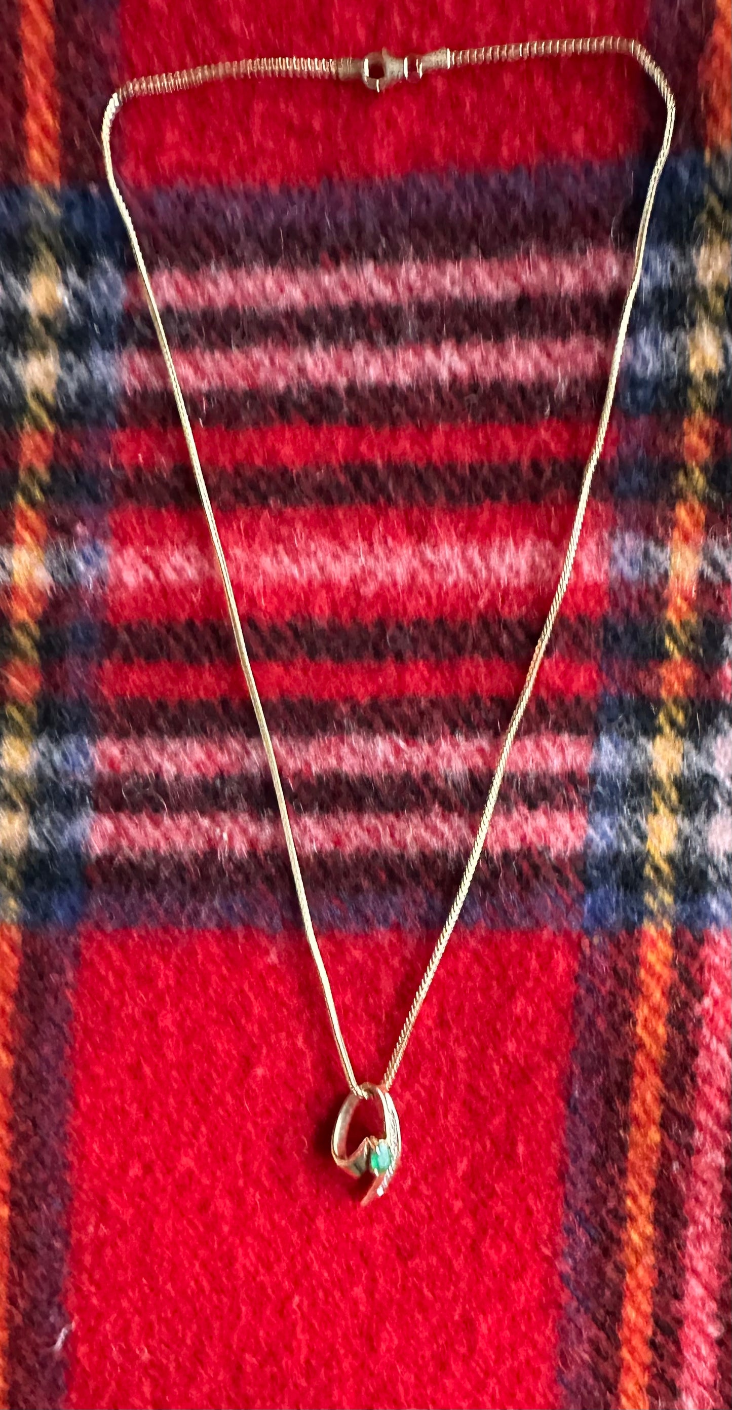 Vintage 14 karat gold emerald, and diamond pendant necklace