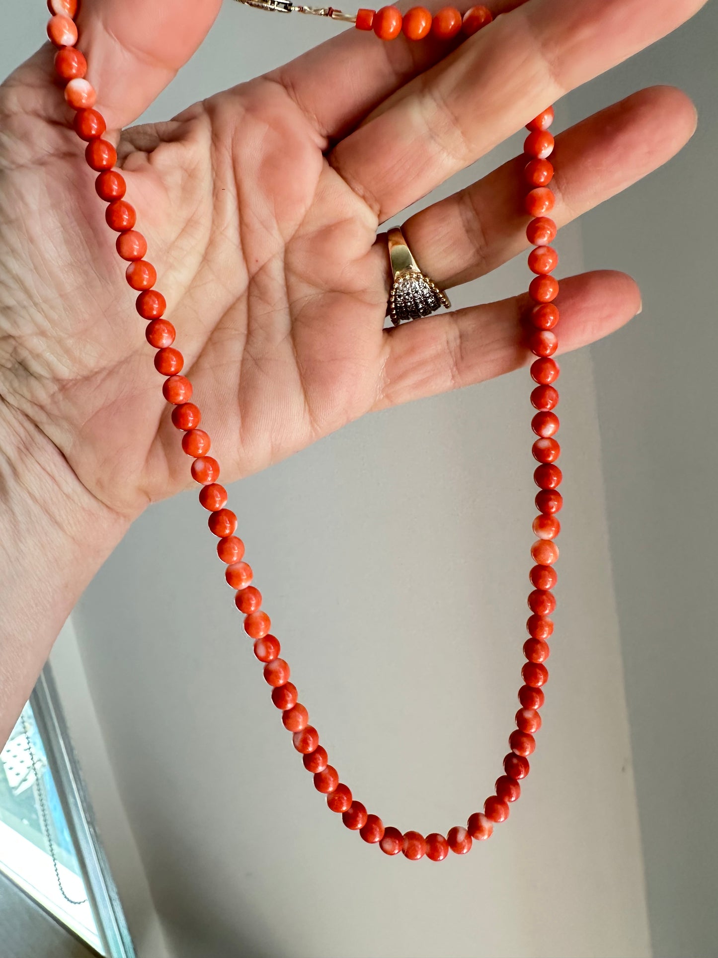 Victorian reddish orange coral beads with 9k clasp