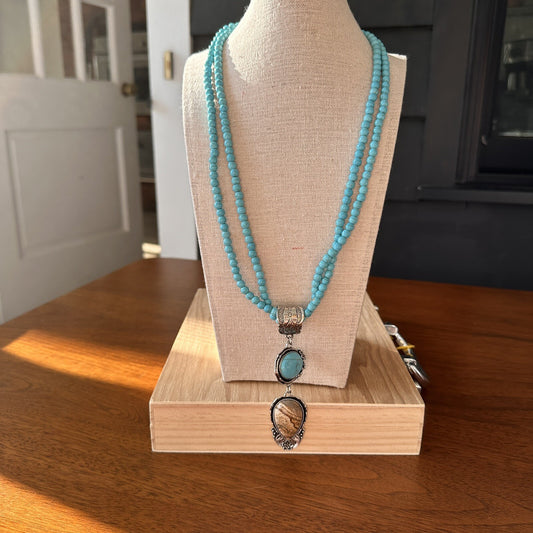 Turquoise Colored stone beaded necklace with large teardrop shape pendant