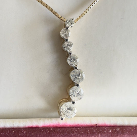 Helzberg 14k Yellow Gold 7 Diamonds necklace Approx .7 Cttw