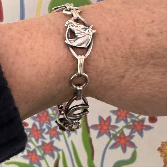 Vintage Sterling horse and horse shoe bracelet
