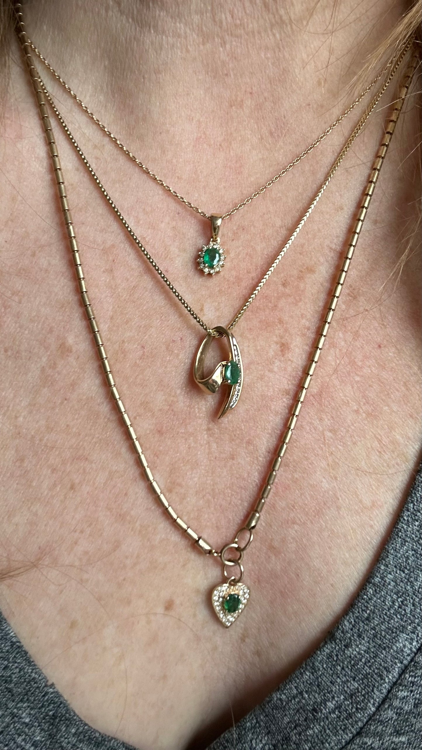 Vintage 14 karat gold emerald, and diamond pendant necklace