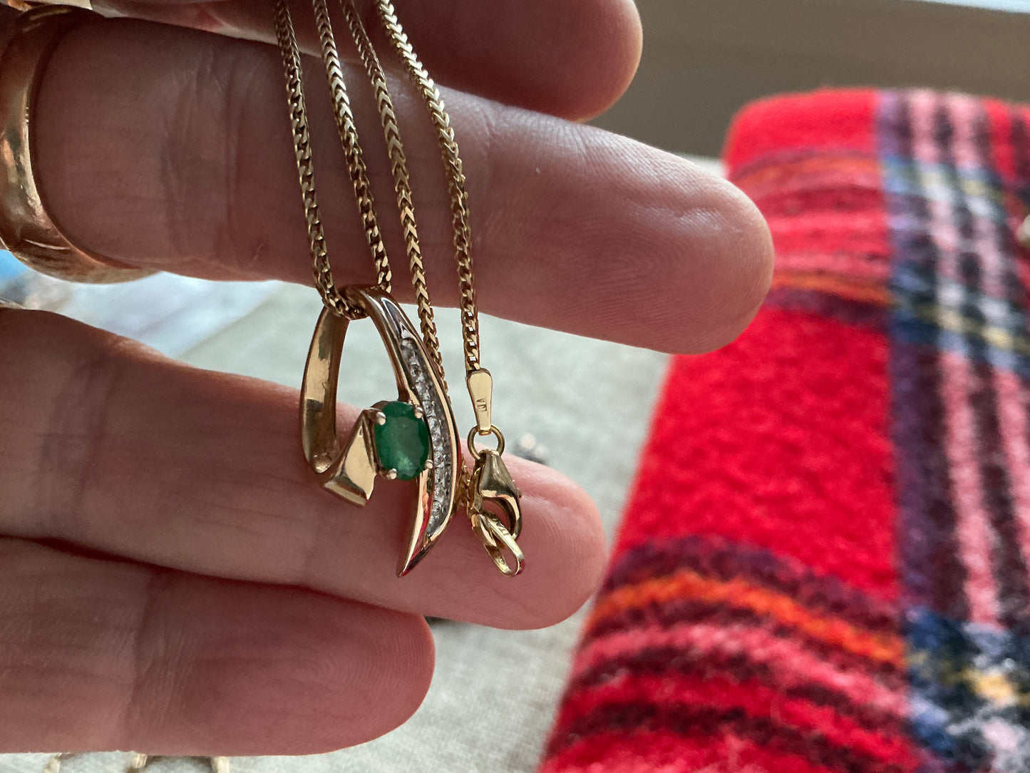 Vintage 14 karat gold emerald, and diamond pendant necklace