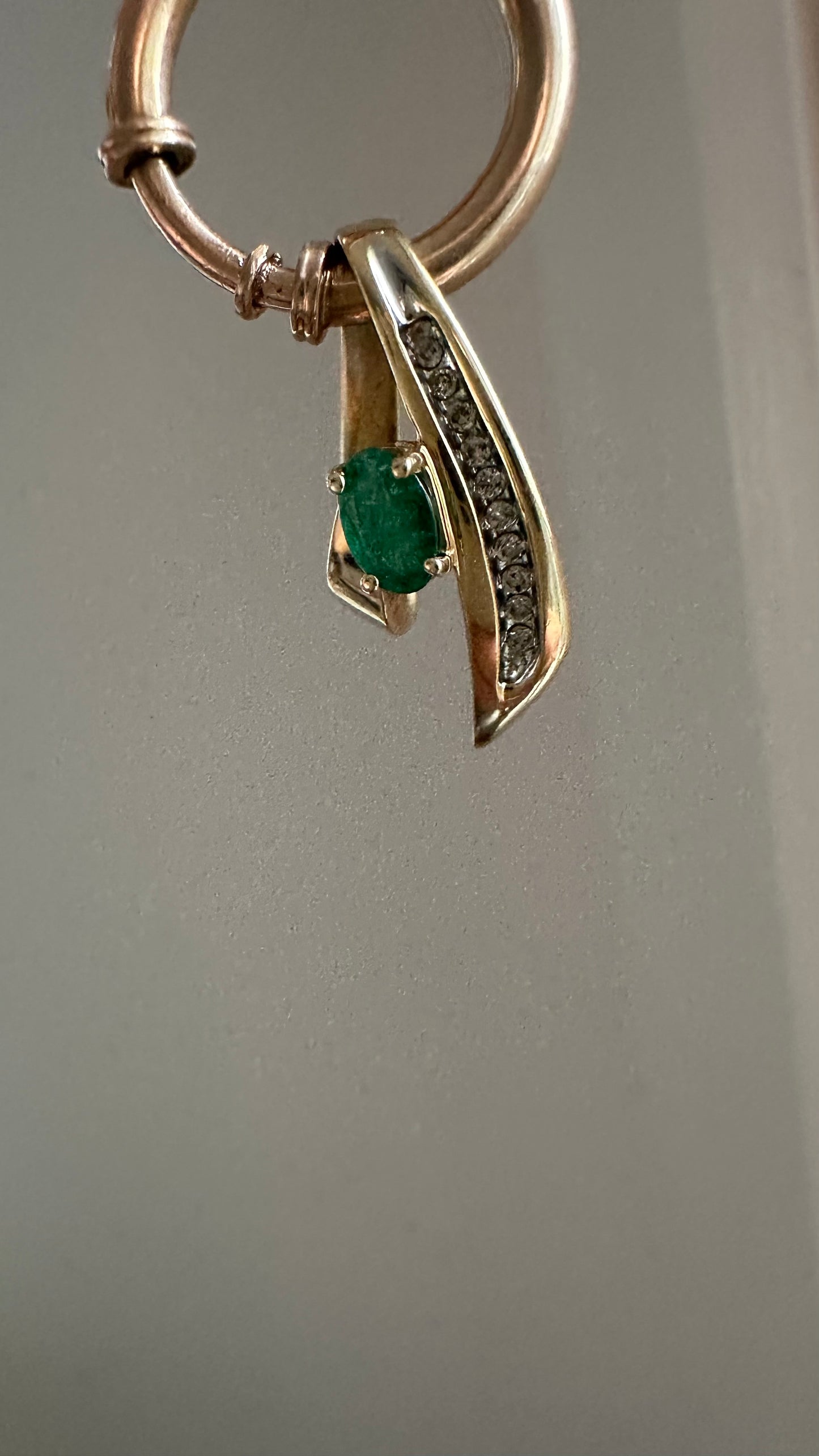 Vintage 14 karat gold emerald, and diamond pendant necklace