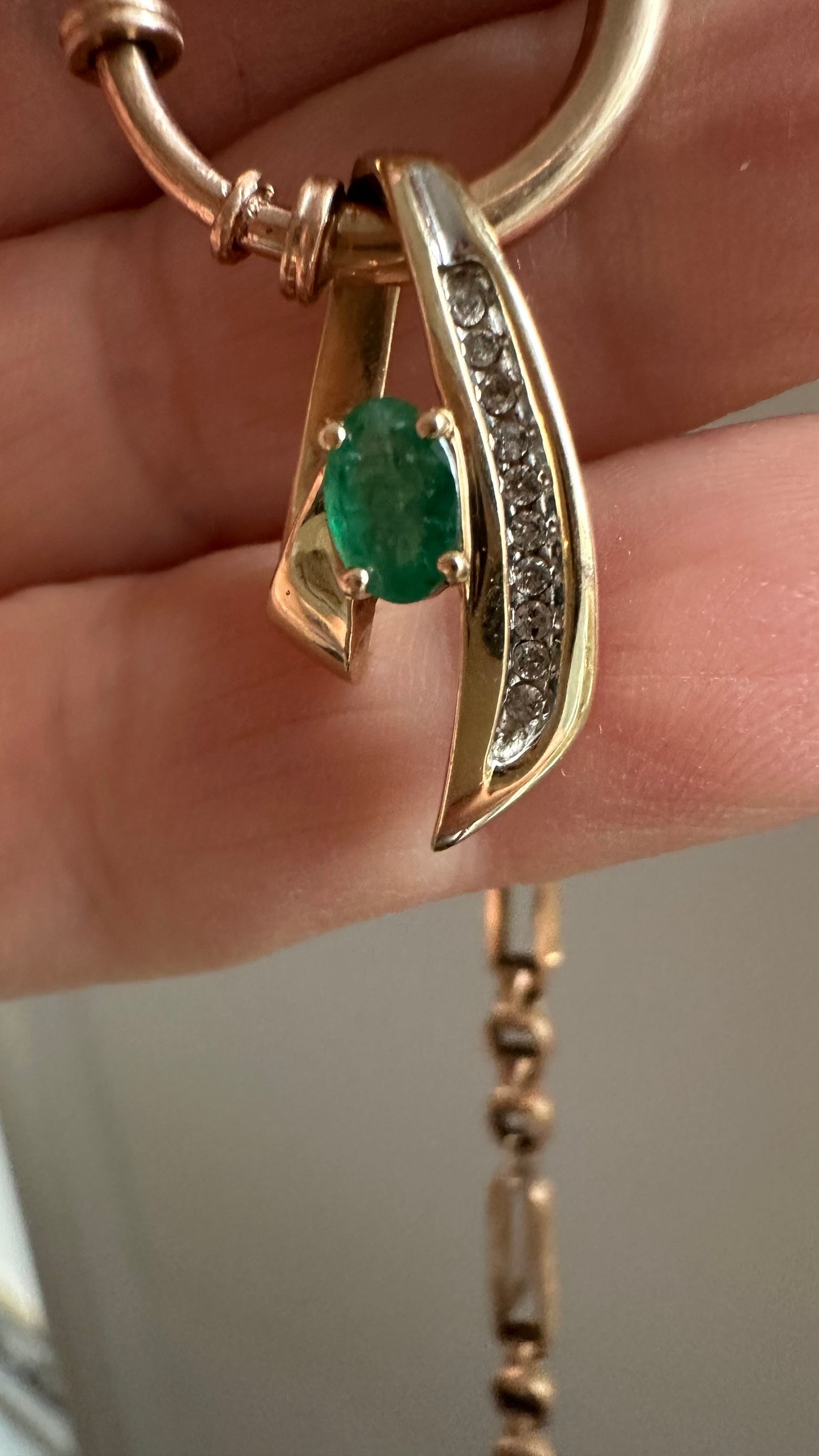 Vintage 14 karat gold emerald, and diamond pendant necklace