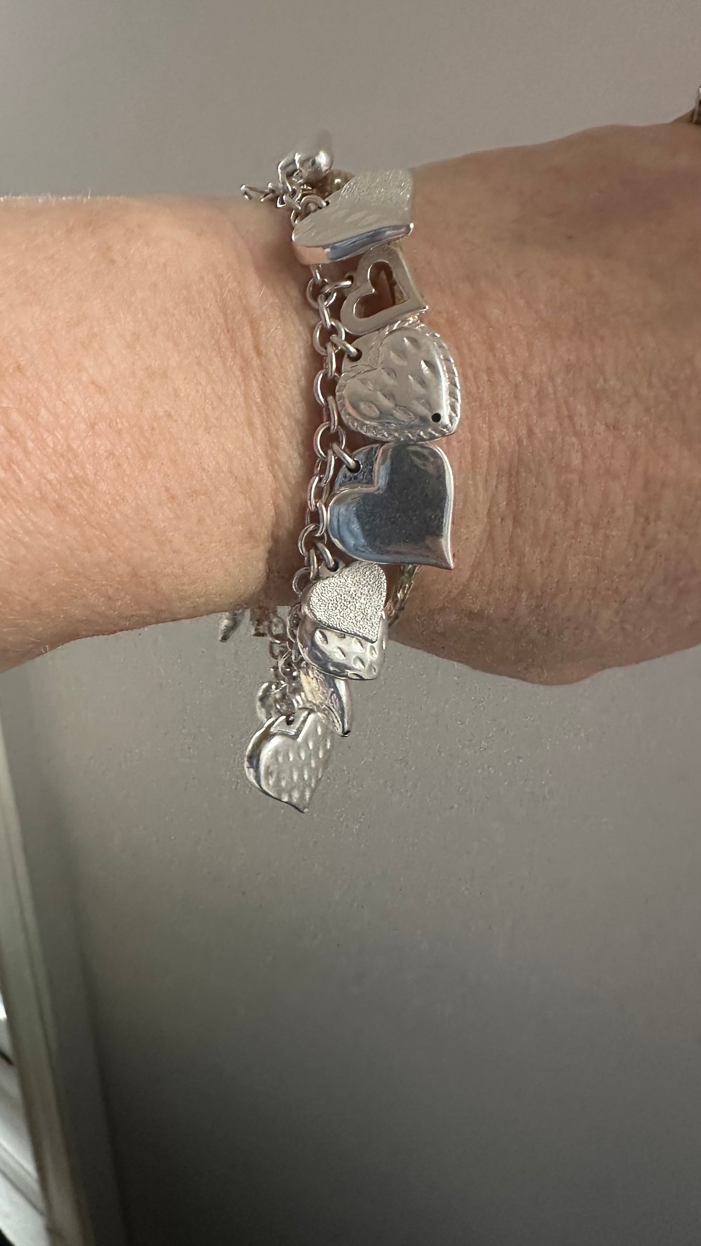 Vintage Sterling puffed hearts charm bracelet