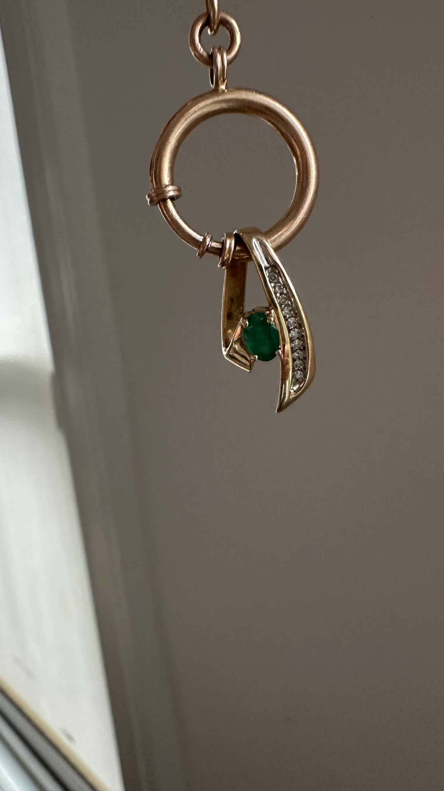 Vintage 14 karat gold emerald, and diamond pendant necklace