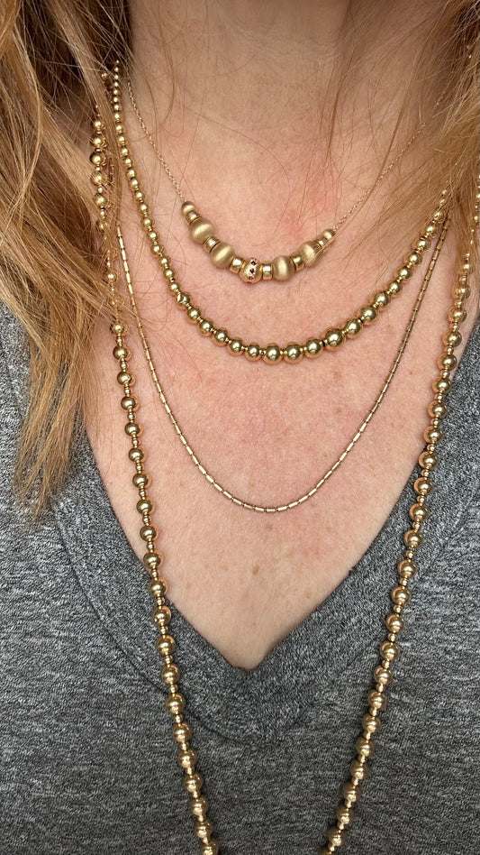 Vintage 14k gold beaded necklace with tourmalines