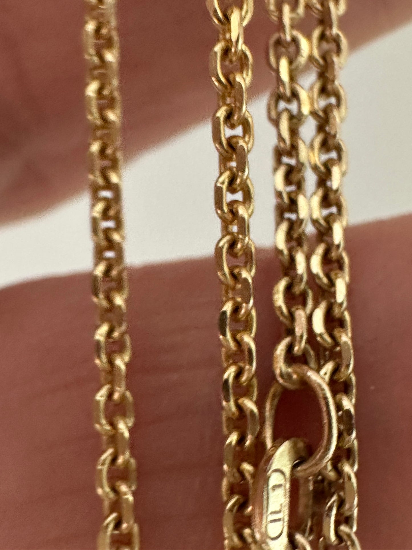 14k gold baby biker bezeled  diamond necklace