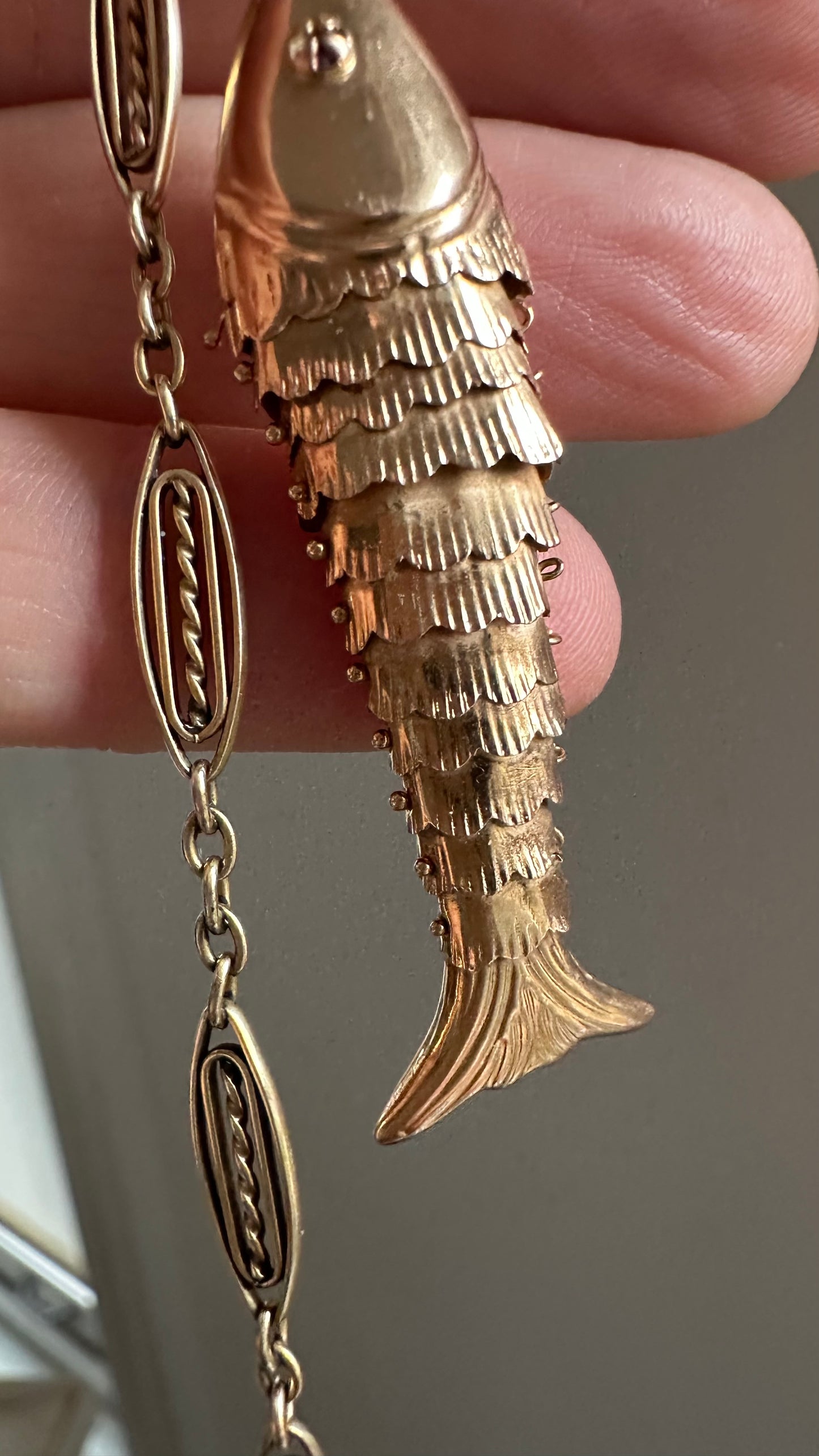 Solid 14K articulated fish charm