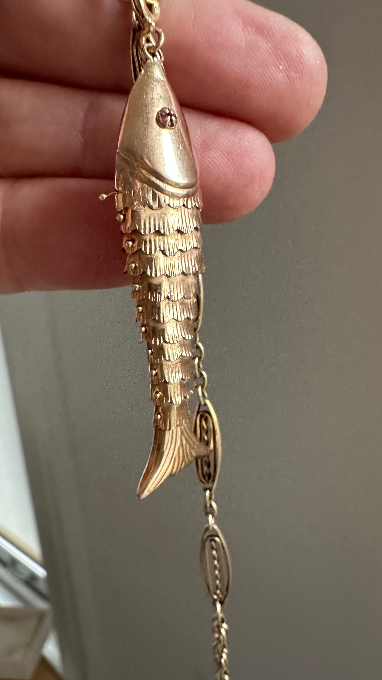 Solid 14K articulated fish charm