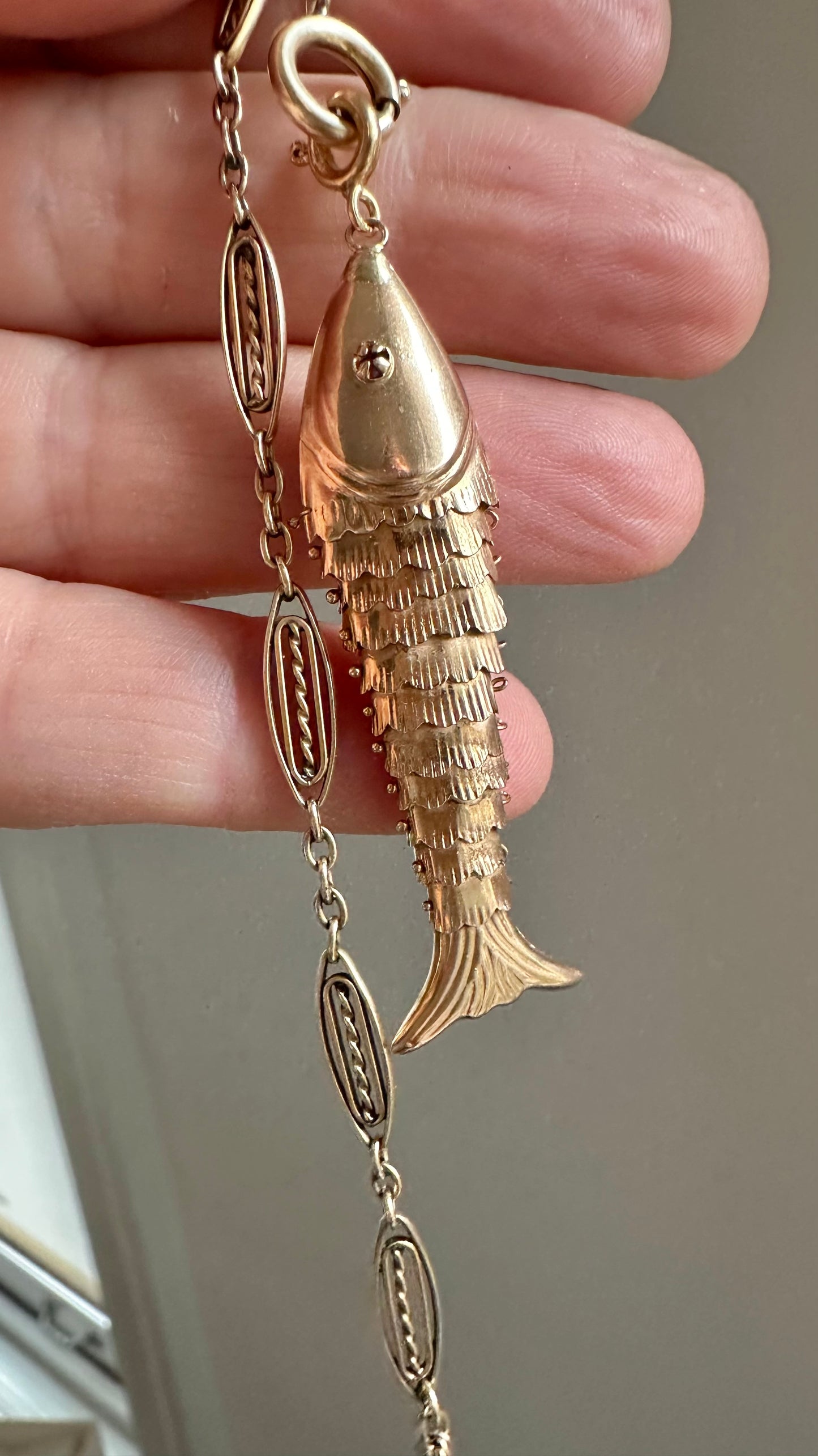 Solid 14K articulated fish charm