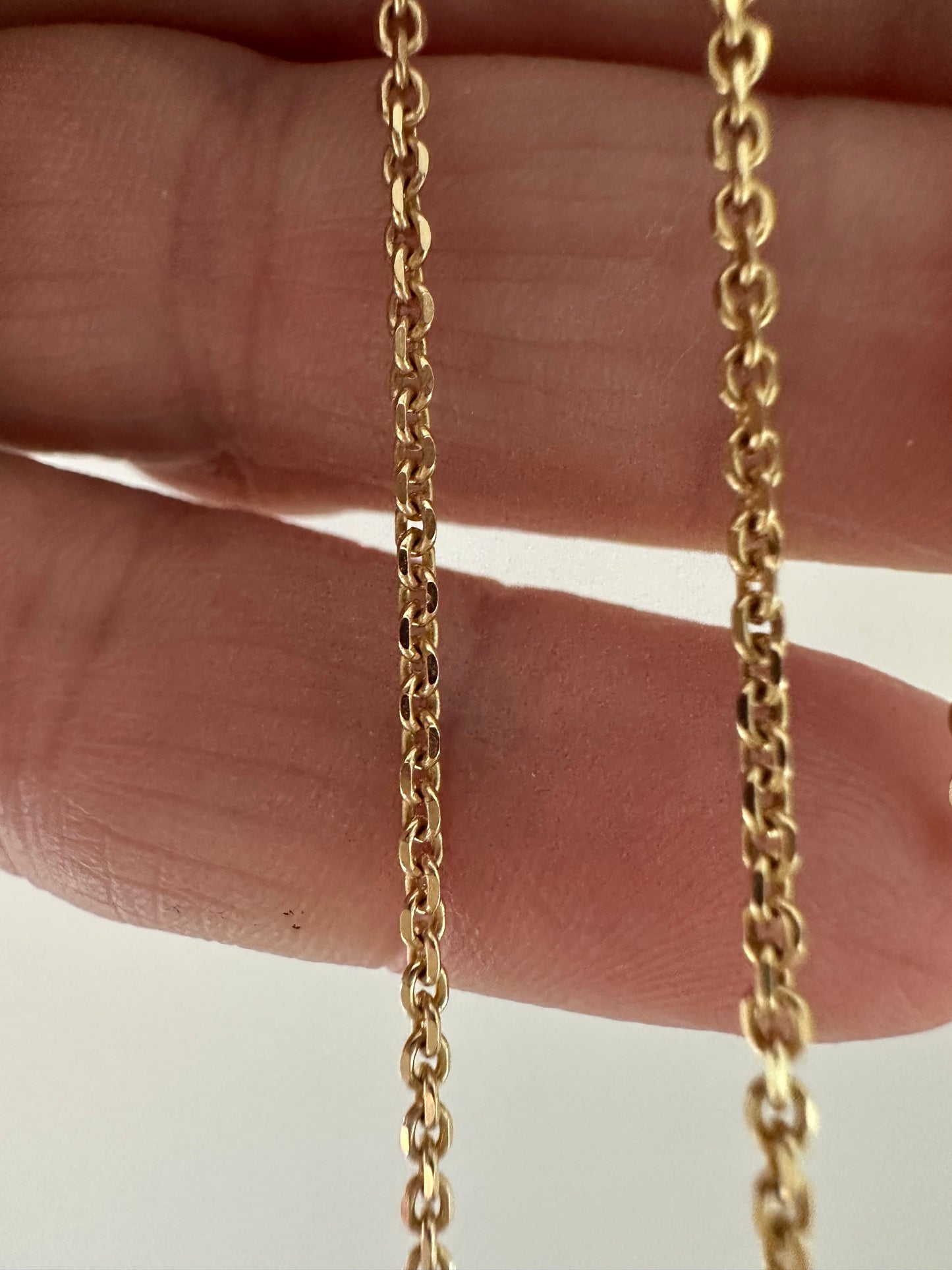 14k gold baby biker bezeled  diamond necklace