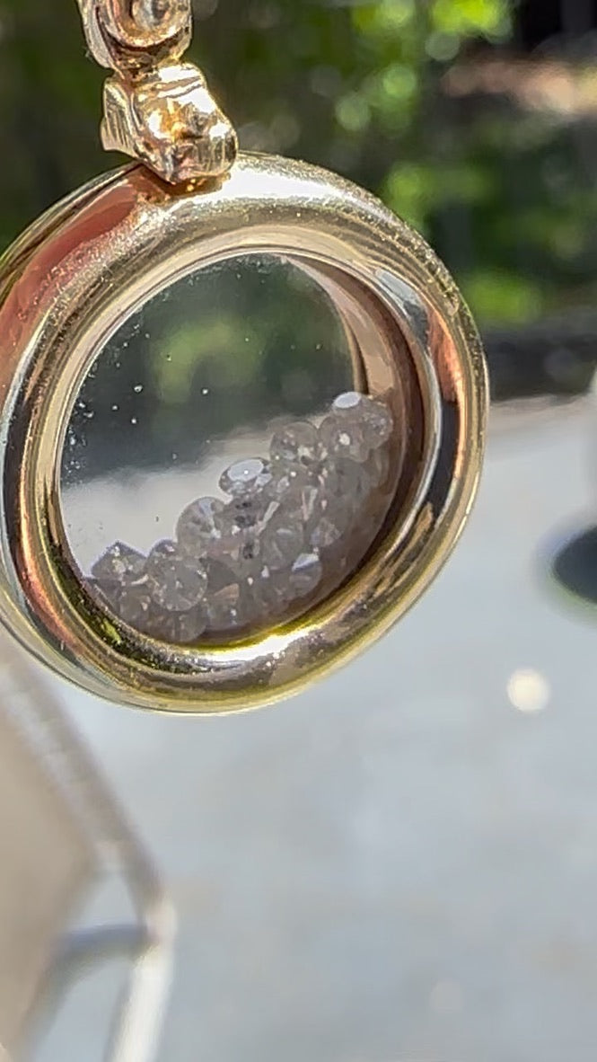 Vintage 14 carat diamond shaker pendant