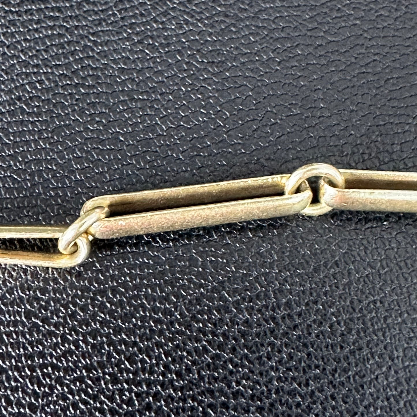 Trombone link watch chain marked  and tests 15k 14.5 inches long
