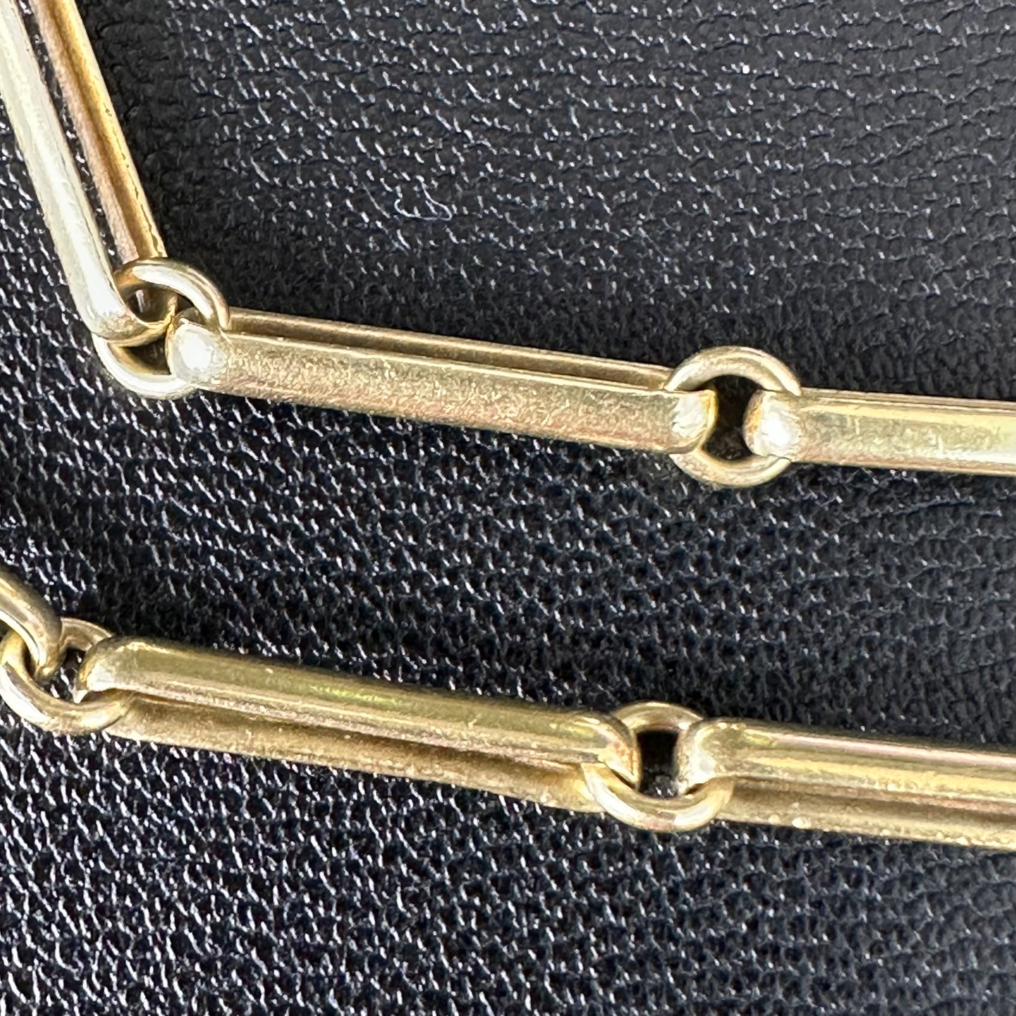 Trombone link watch chain marked  and tests 15k 14.5 inches long