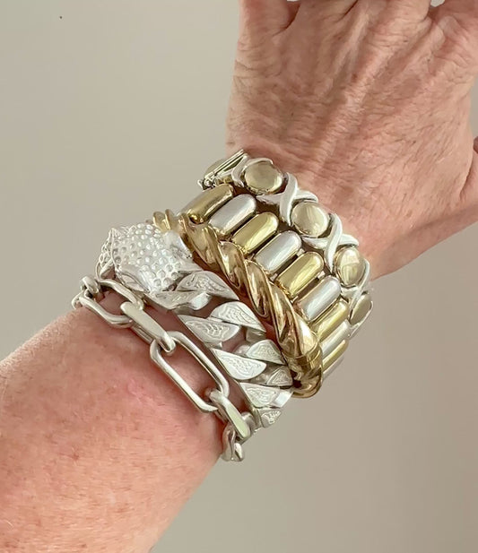 Vintage sterling silver with a gold hue Milor Thick twist hinged  bangle