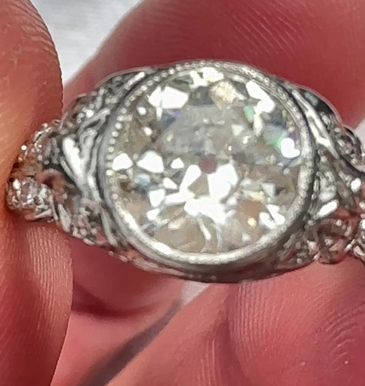 Old European Brilliant (round) diamond measuring 7.25 - 7.45 x 4.19mm in size, 1.53 carats with a color grade of "J" and clarity grade of "VS2